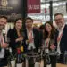 people at a wine trade exhibition